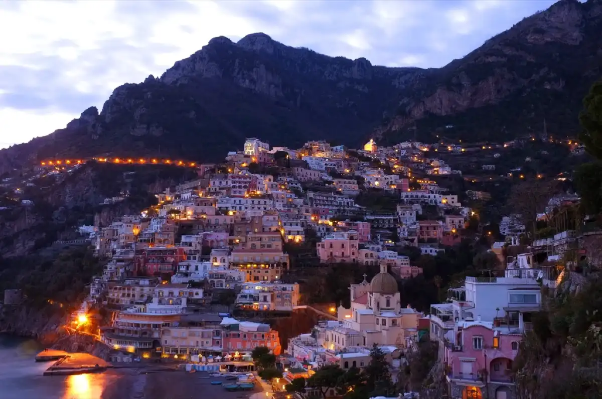 Positano on the Amalfi Coast at dusk — tax in Italy for foreigners