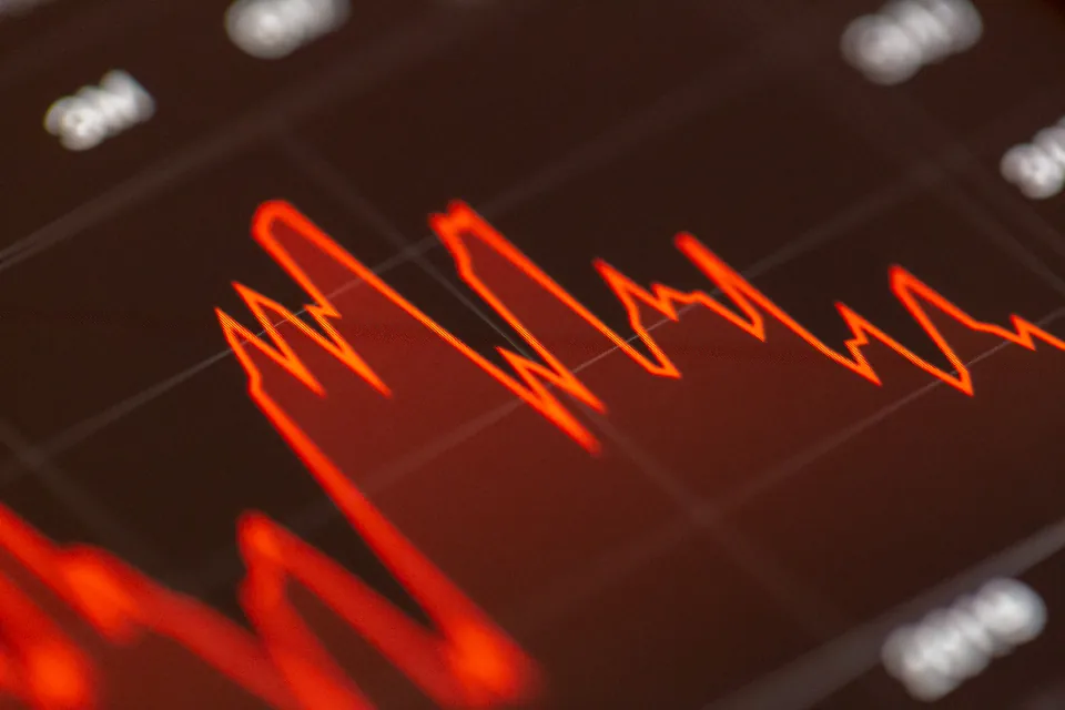 Stock prices on a trading screen, investment income under the U.S.-Italy tax treaty